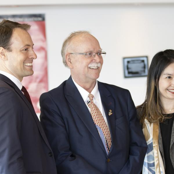Adam Walker, MLA for Parksville-Qualicum, stands with Anne Kang, Minister of Advanced Education and Skills Training.