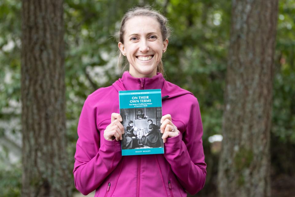Haley with a copy of her book