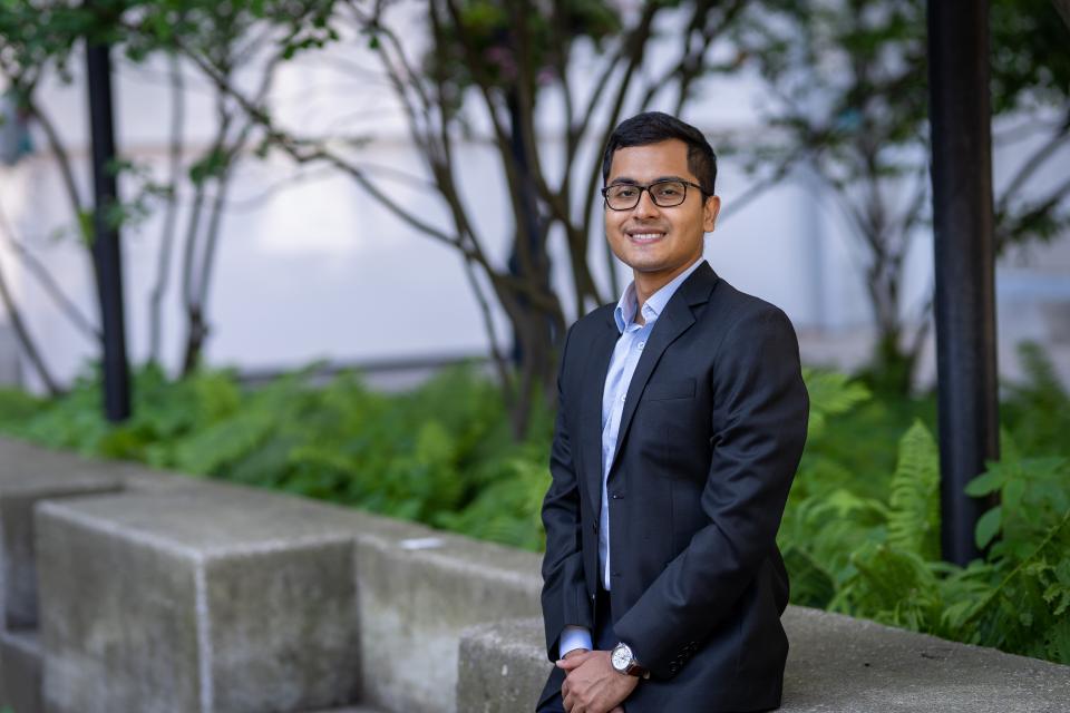 portrait of Sandipan Debnath on a city street